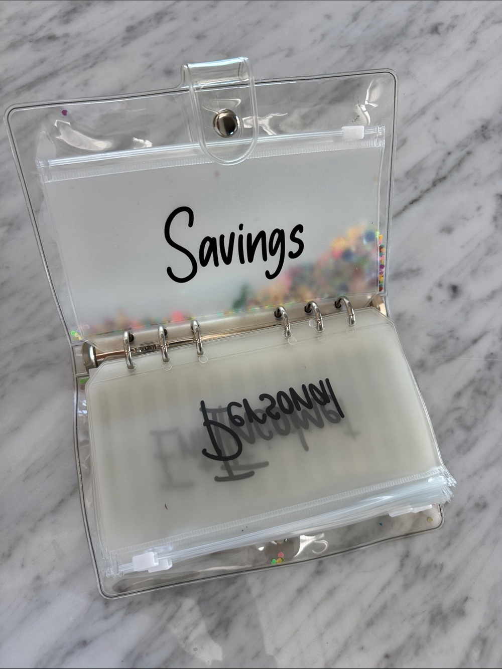 Savings Binder with Zipper Pouches. Clear pvc.